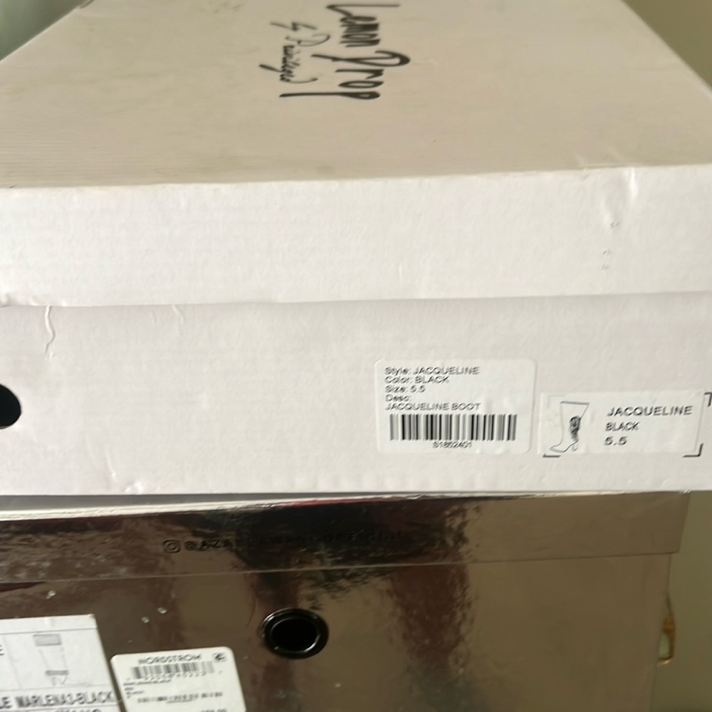 Black boots with silver rhinestones.